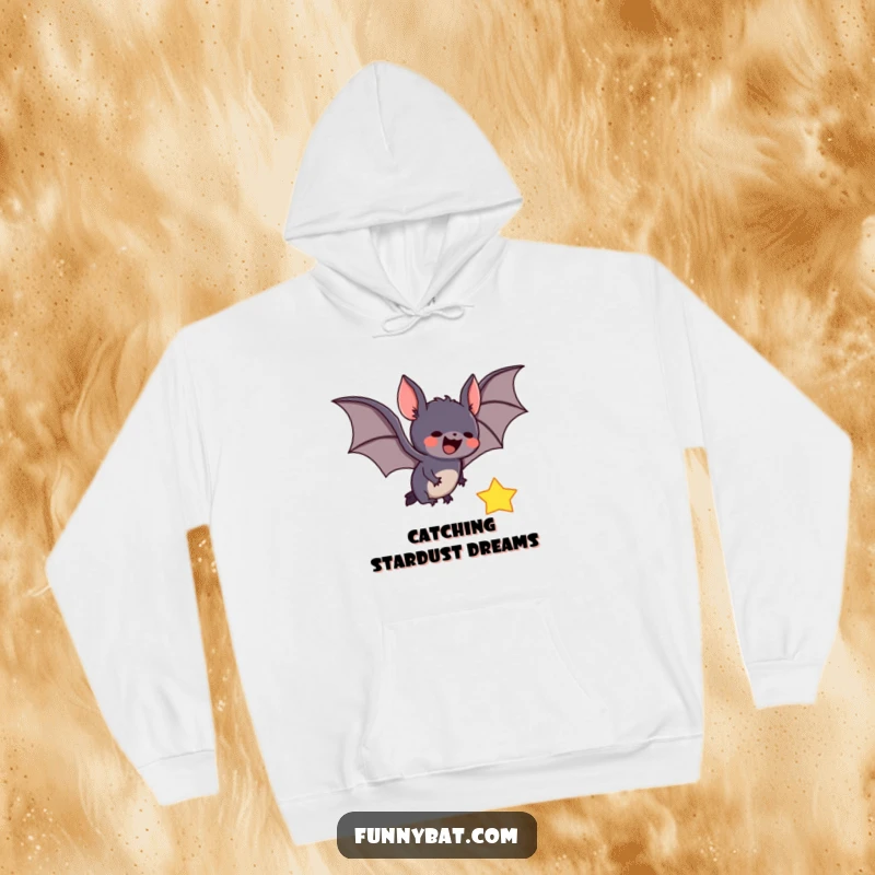 Funny hoodie showcasing a joyful bat enthusiastically swooping to catch a radiant falling star against a backdrop of a star-filled night sky.
