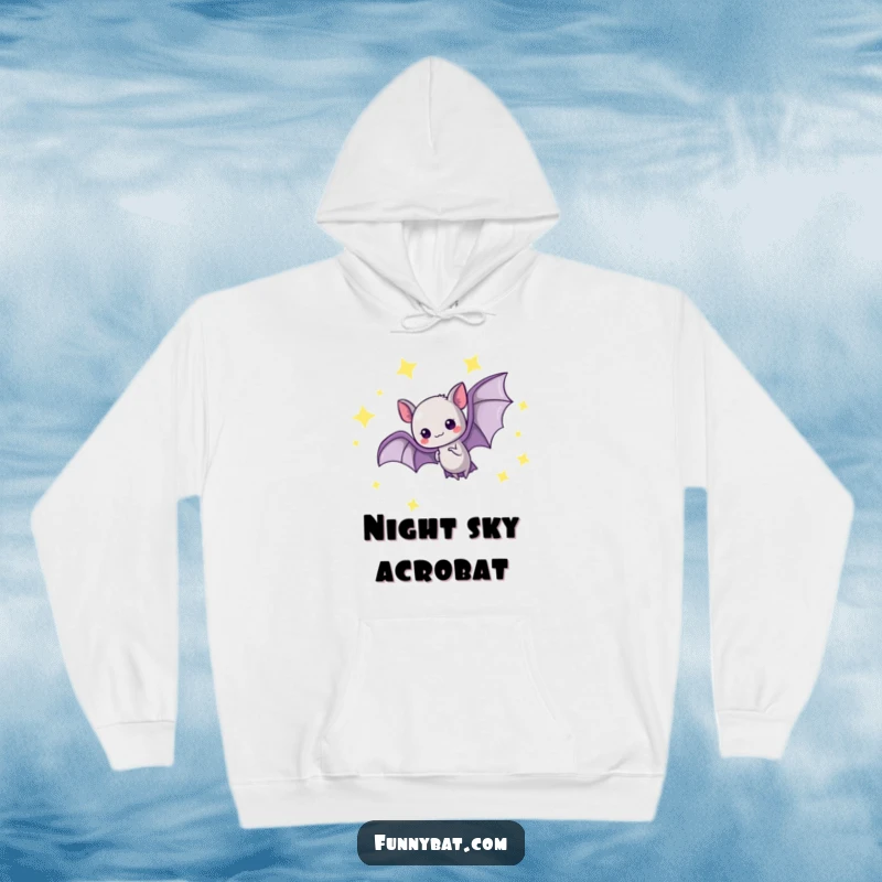 Funny kawaii bat hoodie featuring a graceful loop-the-loop amidst glowing stars, a cozy celestial garment.