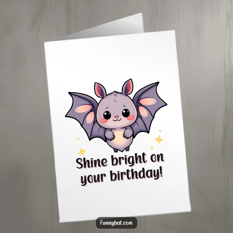 Funny Free Printable Birthday Card: A whimsical bat radiating soft light and emitting cheerful, happy sparkles.
