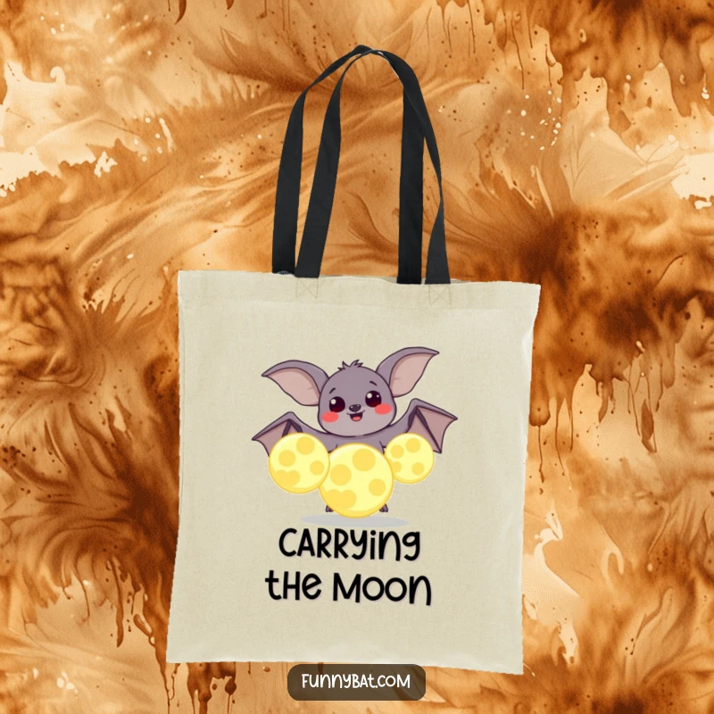 Funny tote bag depicting a plump bat with joyful eyes juggling large, glowing moons, perfect for carrying everyday essentials.