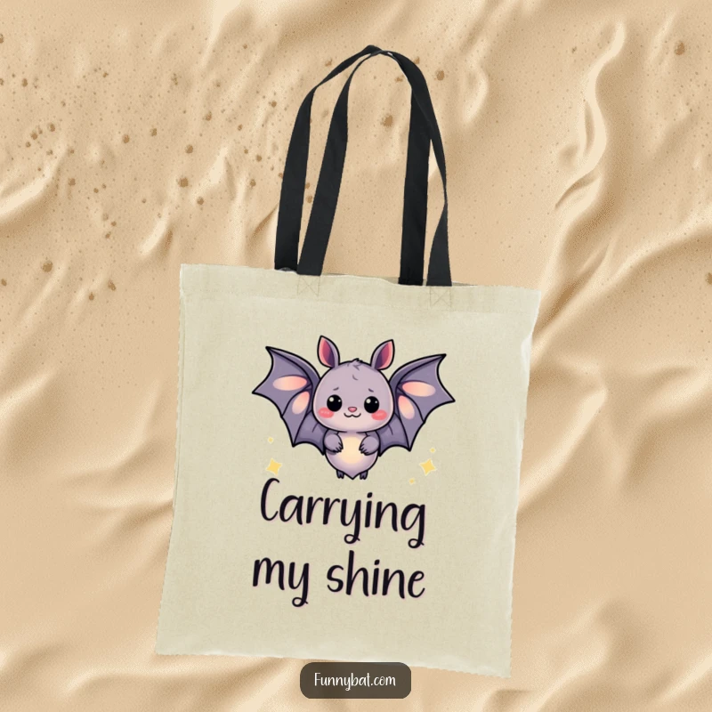 Funny tote bag featuring a whimsical bat emitting a soft glow and happy sparkles, perfect for adding a magical touch to your day.